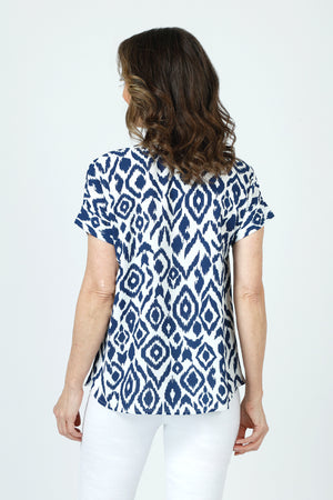 Top Ligne Ikat Airflow Round Neck Top.  Navy ikat print on a white background.  Round neck with dolman short sleeve sewn cuff top.  Curved hem.  Relaxed fit._59980971409774