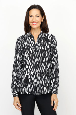 Top Ligne Dots Button Down Blouse in Black/White.  Streaked dots pattern in white on black.  Pointed collar notched v neck button down.  Long sleeves with button cuffs.  Relaxed fit._61205517762926