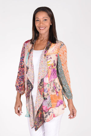 Lolo Luxe Draped Front Patchwork Jacket in Latte. Open drape front jacket with patchwork construction. 3/4 sleeve with elastic cuff. Longer in front. Relaxed fit._34340673355976