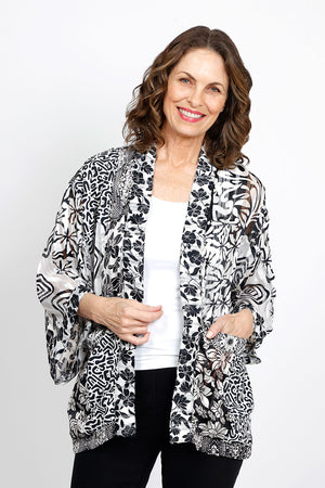 Lolo Luxe Boxy Patchwork Jacket in Black/White.  Open kimono jacket with mixed patchwork of floral and geometric.  2 front patch pockets.  Boxy shape. Relaxed fit._35432817590472