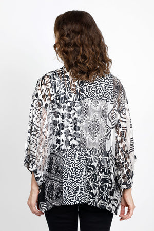 Lolo Luxe Boxy Patchwork Jacket in Black/White. Open kimono jacket with mixed patchwork of floral and geometric. 2 front patch pockets. Boxy shape. Relaxed fit._35432817557704