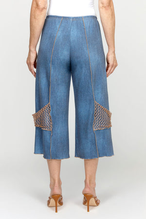 Top Ligne Jean Terry Seamed Crop in Denim.  Lightly distressed denim look with elastic waist.  Raised center leg seams with contrast stitching.  Gold mesh decorative pocket at side lower leg.  25 1/2" inseam._60951646568814