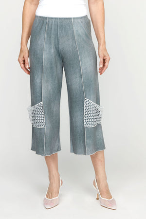 Top Ligne Jean Terry Seamed Crop in Pewter.  Lightly distressed denim look with elastic waist.  Raised center leg seams with contrast stitching.  Silver mesh decorative pocket at side lower leg.  25 1/2" inseam._60951646536046