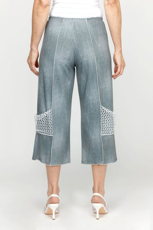 Top Ligne Jean Terry Seamed Crop in Pewter.  Lightly distressed denim look with elastic waist.  Raised center leg seams with contrast stitching.  Silver mesh decorative pocket at side lower leg.  25 1/2" inseam._60951646503278