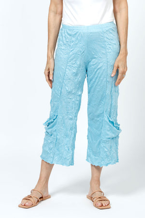 Top Ligne Crinkle Crop with Draped Pocket in Aqua.  2" elastic waist with raised center seams.  Wide cropped leg with draped pockets on outer leg.  21" inseam._35194872824008
