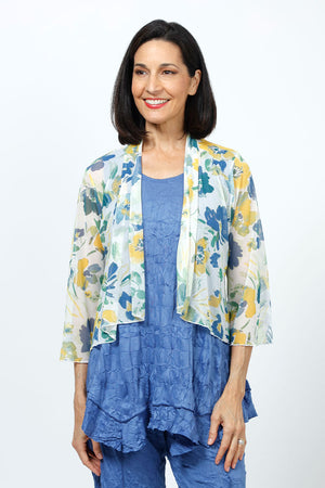Top Ligne Mesh Floral Cardigan.  Blue, yellow and green floral print on a white background.  Drape front cropped cardigan with 3/4 flutter sleeve.  Sewn edges.  Relaxed fit._35195386462408