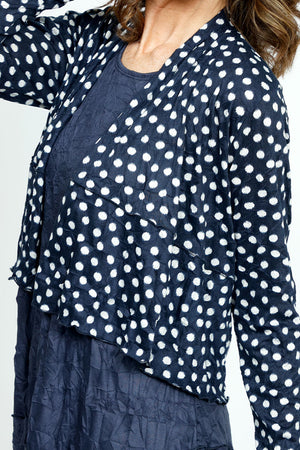 Top Ligne Polka Dot Seam Shrug in Navy.  Crinkle fabric open front shrug.  Long sleeves.  Sewn edges.  High low hem.  Relaxed fit._52871689437550