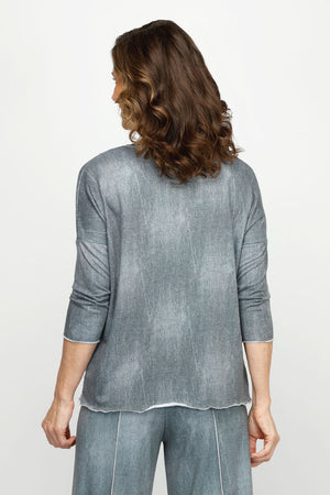 Top Ligne Jean Terry Tee with Net Pocket in Pewter.  Lightweight terry with distressed denim look.  Crew neck 3/4 sleeve top with raised front asymmetric seam.  White metallic mesh patch pocket in left front.  Contrast top stitching at neck sleeve hem, front seam and hem. Relaxed fit._60954369622382
