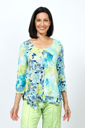 Top Ligne Crinkle Mixed Florals Tee in Aqua. Aqua, lime and blue floral prints. Scoop neck 3/4 sleeve top with raised center front seam. 2 different floral patterns on front and sleeves. Asymmetric flounce inset at hem. Relaxed fit._35195838103752