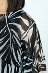 Top Ligne Palm Leaves Sheer Top in Black with white palm leaf print.  Crew neck sheer boxy top with 3/4 dolman sleeve.  Solid black crinkle inset at hem and cuff.  Sharkbite hem.  Oversized fit._t_52912097067374