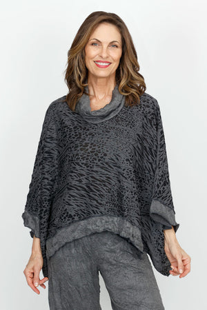 Top Ligne Mixed Animal Print Topper in Charcoal.  Animal print body and sleeves with asymmetric pleating.  Solid crinkle cowl neck with dolman 3/4 sleeve.  Solid crinkle inset at hem and cuff. Inverted u-shaped hem.  Oversized fit._61385650045294