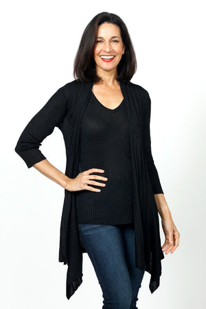 Ten Oh 8 Ribbed Tank & Cardigan Set in Black.  Ribbed v neck tank with smaller rib trim at neck and armhole.  Open shawl collar cardigan with vertical rib through body.  Horizontal rib insert at back wraps to front creating swing shape.  One size fits many._34621589258440