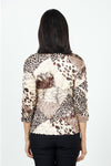 Top Ligne Animal Print Puckered Top in Leopard. Scoop neck 3/4 sleeve top. Puckered crinkle fabric stretches to fit sizes XS to XL. Relaxed fit._t_34621079322824