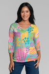 Whimsy Rose Riviera V Neck Top in Multi. Bright pastel mixed geometric pattern print. V neck 3/4 sleeve top with a burnout & sublimation effect. Classic fit._t_34899889389768