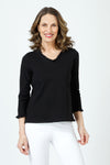 Top Ligne Ruffle V Neck Tee in Black.  V neck 3/4 sleeve tee with ruffle trim at neck and cuff.  Side slits.  Relaxed fit._t_60003021324654