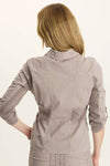 Wearables Wexel Jacket in Foxglove Pigment, a gray beige.  Pointed collar zip front jacket.  3/4 sleeve with twill tape adjustment.  2x1 rib inset at waist and under arms.  Single breast patch pocket.  2 front pouch pockets with button flap extra pocket.  Twill tape accents.  Contour seaming.  Classic fit._t_61438005739886