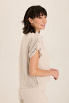 Wearables Abner Top in Ripple pigment.  Pointed collar button down with short roll tab sleeves.  Raw edges.  Front patch pocket with raw edge trim.  Inset jersey side panels.  High low hem.  Relaxed fit._t_60009031172462