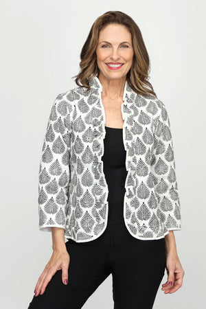 Lolo Luxe Leaves Ruffled Open Jacket in Black/White.  Black leaf stamped print on a white background.  Quilted open front jacket with white quilted lining.  3/4 sleeve.  Ruffle trim around neckline, front and hem.  White piping at edges.  Relaxed fit._60670847418734