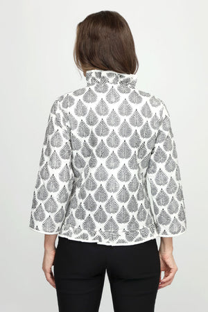 Lolo Luxe Leaves Ruffled Open Jacket in Black/White.  Black leaf stamped print on a white background.  Quilted open front jacket with white quilted lining.  3/4 sleeve.  Ruffle trim around neckline, front and hem.  White piping at edges.  Relaxed fit._60670847451502