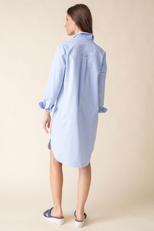 Habitat Perfect Travel Cafe Dress in Oxford Blue.  Pointed collar button down dress.  Shirt tail high low hem.  3/4 sleeve with 2 button cuff.  Relaxed fit._59962152616302