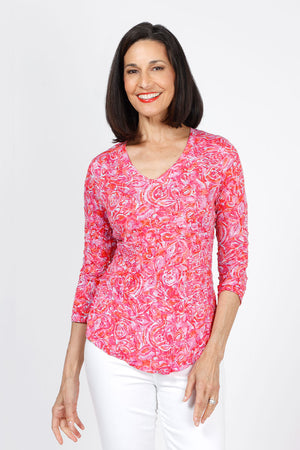 Top Ligne Floral Bloom V Neck Top in Pink.  Stylized rose print in pink orange and white.  V neck crinkle top with 3/4 sleeve.  U shaped hem.  Relaxed fit._35333660016840