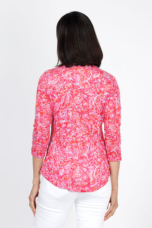 Top Ligne Floral Bloom V Neck Top in Pink. Stylized rose print in pink orange and white. V neck crinkle top with 3/4 sleeve. U shaped hem. Relaxed fit._35333660049608