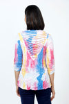 Top Ligne Watercolor Shredded Back Top in Multi. Bright streaks of blue, pink and yellow on a white background. V neck 3/4 sleeve top with 4 button trim at sleeve hem. V insert at back with shredded strips of fabric. Relaxed fit.._t_35222513549512