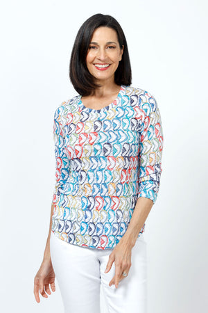 Top Ligne Mixed Directions Crew Top in Multi.  Multi colored print with abstract arrows.  Crew neck 3/4 sleeve top with curved hem.  Relaxed fit._35222591406280