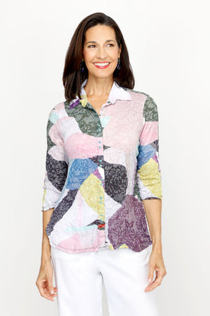 Top Ligne Collage Colors Snap Front Shirt in Multi.  Abstract blocks of multi colors.  Pointed collar snap front shirt with pairs of turquoise snaps.  3/4 sleeve with split cuff and lace-up detail.  Relaxed fit._61205465497966
