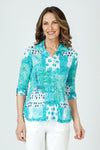 Top Ligne Dots & Solids Snap Front Shirt in Turquoise.  Bright swirls and bloc print with multi dot detail.  Pointed collar snap front with pairs of turquoise snaps.  3/4 sleeve with split hem and lace-up detail.  Shirt tail hem.  Relaxed fit._t_59961640812910