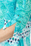 Top Ligne Dots & Solids Snap Front Shirt in Turquoise.  Bright swirls and bloc print with multi dot detail.  Pointed collar snap front with pairs of turquoise snaps.  3/4 sleeve with split hem and lace-up detail.  Shirt tail hem.  Relaxed fit._t_59961640780142