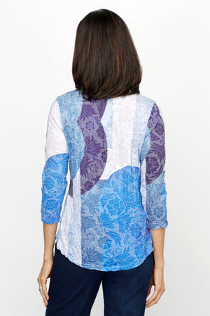 Top Ligne Colorblock Crinkle Crew in Blue.  Shades of blue, purple and white circular bocks. overprinting a floral background.  Banded crew neck with 3/4 sleeve. Curved hem.  Relaxed fit._61205437022574