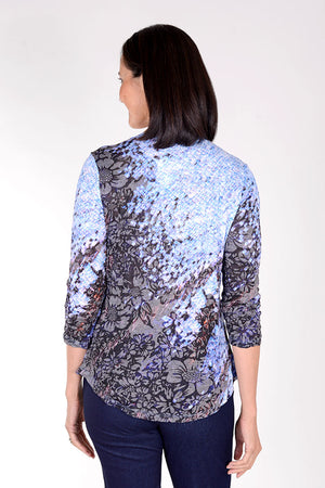 Top Ligne Floral Pop V Neck Top. light blue mosaic print monochromatic color print on diagonal and part of sleeve. V neck with 3/4 sleeve. Crinkle top. Relaxed fit._34378706485448