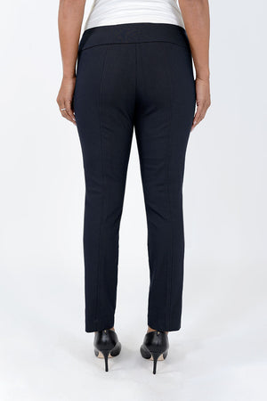 Elliott Lauren Faux Pocket Ankle Pant in Navy. Pull on pant with 3" waistband and faux angled pocket detail at sides with grommet trim. Slim leg. 28 1/2" inseam._34452324483272