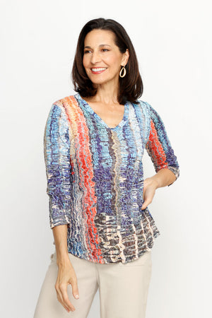 Top Ligne Color Ripples V Neck in Multi.  Vertical rippled stripes in multi colors.  V neck crinkle top with 3/4 sleeve.  Curved hem.  Relaxed fit._61704101200238