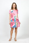 Top Ligne Starry Scene Dress in Multi. Large abstract floral print in shades of pink blue and green. Crew neck short sleeve dress with inset flounce at bottom 3rd. Ruffle trim at neck and hem. Raw edges. Relaxed fit._t_35007916998856