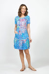 Top Ligne Starry Scene Dress in Blue Multi. Expressionist-inspired abstract print. Crew neck short sleeve dress with inset flounce at bottom 3rd. Ruffle trim at neck and hem. Raw edges. Relaxed fit._t_35007957303496