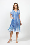 Top Ligne Lines Bubble Dress in Blue Multi.  Gradent blue and white vertical lines print.  V neck short sleeve dress with 2 front slash pockets.  Dress has internal ties below hip that can be tied or not to change the hem line.  A line shape. Relaxed fit._t_35000114806984