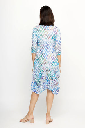 Top Ligne Chevron Pocket Dress in Multi.  Subtle pastel ombre chevron pattern.  V neck 3/4 sleeve crinkle dress.  Asymmetric seamed flounce hem.  2 front patch pockets.  Relaxed fit._61707650564462