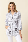 Habitat Perfect Travel Parisian Blouse in White.  Black graffiti and symbols on white.  Pointed collar button down with 3/4 sleeve.  2 front angled slash pockets.  Shirt tail hem.  Relaxed fit._t_59962105364846