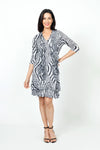 Top Ligne Groovy Stripes Cardigan. Crew neck open front cardigan with 3 tie closures. 3/4 sleeve. Crinkle fabric. Relaxed fit._t_34619269447880
