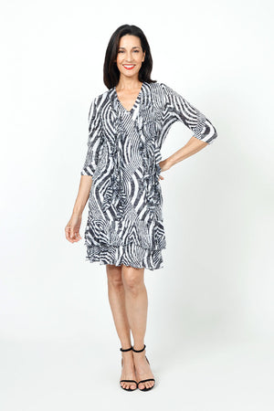 Top Ligne Groovy Stripes Cardigan. Crew neck open front cardigan with 3 tie closures. 3/4 sleeve. Crinkle fabric. Relaxed fit._34619269447880