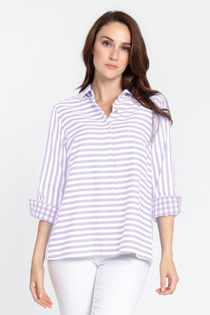 Hinson Wu Xena Striped Zip Back Blouse in Lilac/White stripes. Pointed collar button down with covered button placket. 3/4 sleeve with turn back checked cuff. Zip back with gold tone zipper and inverted back pleat lined in check. Relaxed fit_34993539383496