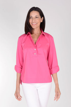 Hinson Wu Aileen Top in Magenta. Popover top with pointed open collar and 2 button placket. 3/4 sleeve with split turn back cuff. Buttons down back of blouse. High low hem. Relaxed fit._34386938790088