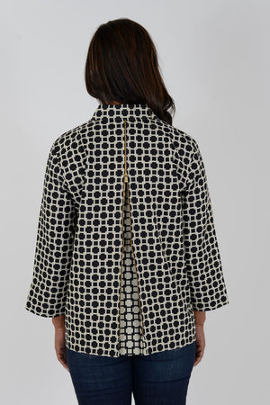 Hinson Wu Xena Geometric Zip Back Blouse in Black/Khaki. Pointed collar button down with hidden button placket and single gold exposed button at neck. 3/4 sleeves. Gold zipper up center back unzips to reveal a reverse color print lining. A line shape. Relaxed fit._34461017505992