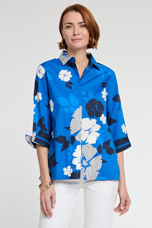 Hinson Wu Xena Vintage Floral Zip Back Blouse in Electric Blue. Black and white retro print on an electric blue background.  Pointed collar button down with covered button placket.  3/4 sleeve with turn back split cuff.  Gold one zipper down center back.  Relaxed fit._34981543674056
