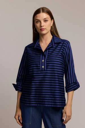 Hinson Wu Aileen Stripe Button Back Blouse in Sapphire/Black.  Popover blouse with ponted collar and 2 button placket.  3/4 sleeve with split fold back cuff.  Horizontal stripe front.  Vertical stripe back with button back down center.  Curved hem.  Relaxed fit._61375820366190