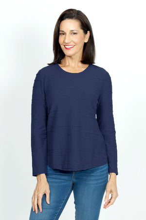Habitat Stream Round Hem Top in Navy.  Crew neck long sleeve top.  Cascading mini horizontal tuck pleats.  Center back seam.  Rounded hem.  Relaxed fit._61210479591790