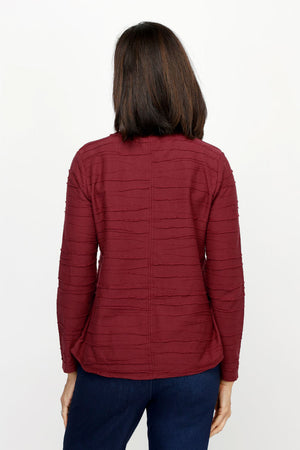 Habitat Stream Round Hem Top in Wine.  Crew neck long sleeve top.  Cascading mini horizontal tuck pleats.  Center back seam.  Rounded hem.  Relaxed fit._61210479526254