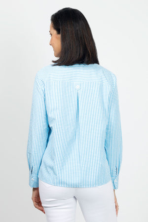 Cali Girls Checked Boyfriend Blouse in Light Blue/White. Pointed collar button down check blouse. Long sleeves with bias check button cuff. Side seams wrap to front. Front slits at seams with bias check button tab. Back yoke. Relaxed fit._35035602649288
